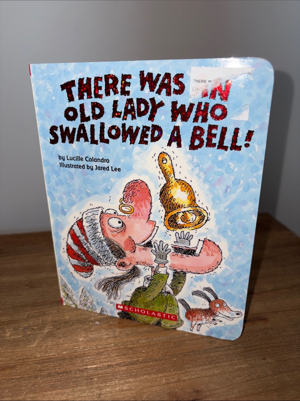 Scholastic There Was an Old Lady Who Swallowed a Bell Board Book